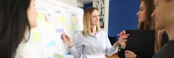 Women in the office discussing the work process