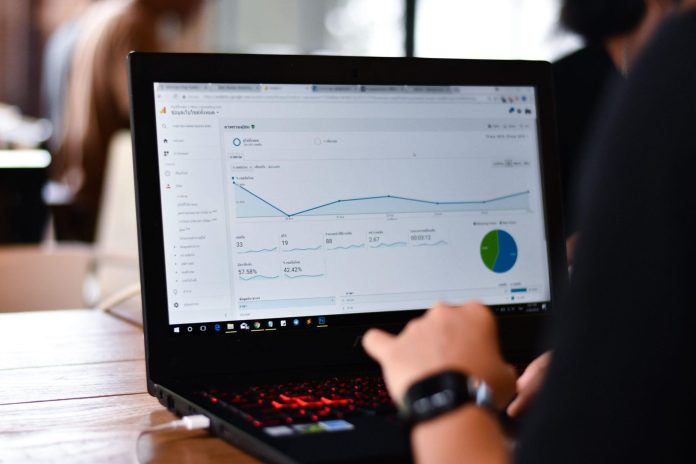 website-analytics-worker-checking-traffic-visitor-report-on-website-data-analytics-stockpack-adobe-stock Website Analytics. Worker checking traffic visitor Report on website. Data Analytics.