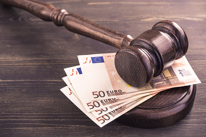 gavel-and-four-euro-banknotes-stockpack-adobe-stock Gavel and four euro banknotes