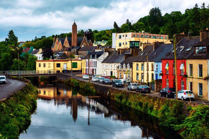 Beautiful landscape in Donegal, Ireland with river and colorful houses
