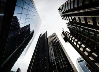 Bank of England Maintains UK Interest Rates Amid Middle East Tensions Bank of England building in London's financial district representing monetary policy decisions affecting Irish business