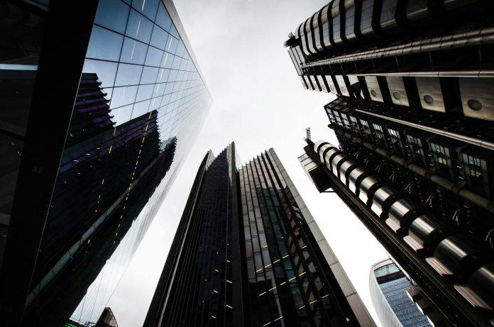 Bank of England building in London's financial district representing monetary policy decisions affecting Irish business