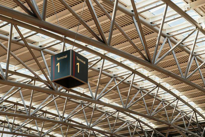 Dubai International Airport terminal with aircraft on tarmac showing resumed operations after security incident