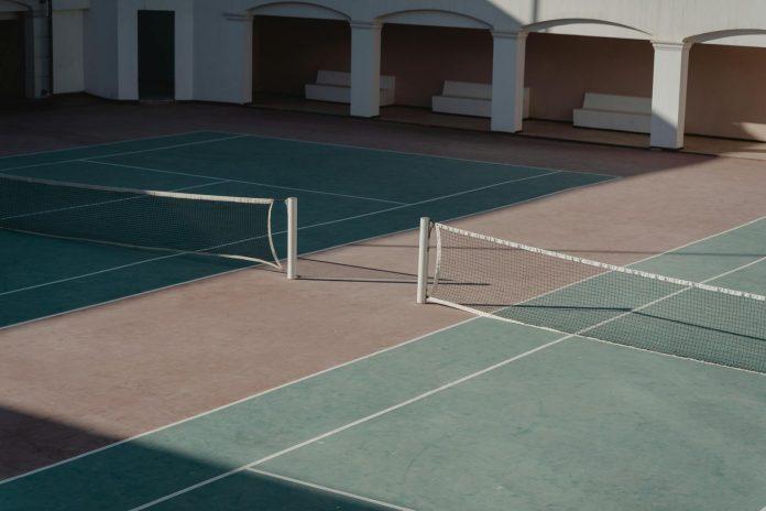 Professional tennis player on court representing Irish sports business and athlete career earnings challenges