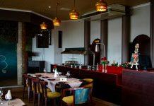 JD Wetherspoon Flags Profit Warning Amid Rising Operational Costs Modern pub interior representing hospitality industry challenges faced by JD Wetherspoon and similar chains