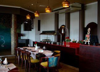 JD Wetherspoon Flags Profit Warning Amid Rising Operational Costs Modern pub interior representing hospitality industry challenges faced by JD Wetherspoon and similar chains