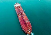 Oil Markets Surge Amid Strait of Hormuz Security Concerns Oil tanker vessel navigating strategic shipping routes highlighting global energy supply chain security concerns