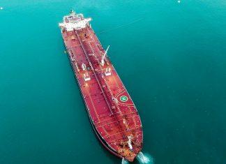 Oil Markets Surge Amid Strait of Hormuz Security Concerns Oil tanker vessel navigating strategic shipping routes highlighting global energy supply chain security concerns