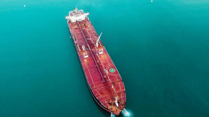 Oil Prices Rise on Hormuz Concerns - Irish Impact Analysis Oil tanker vessel navigating strategic shipping routes highlighting global energy supply chain security concerns