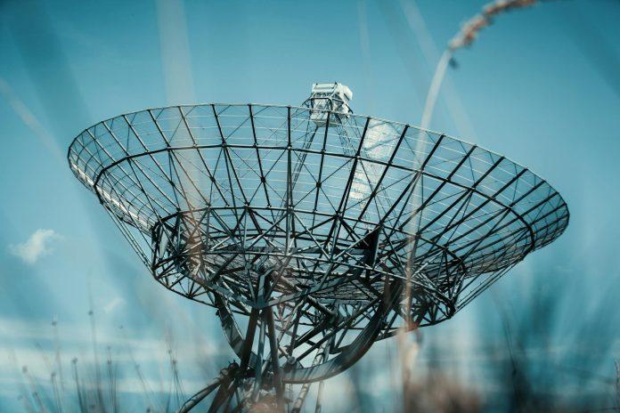 Amazon in Talks to Acquire Globalstar Satellite Network Satellite communications network infrastructure representing Amazon's expansion into global telecommunications sector