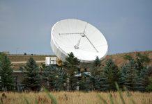 Amazon Pursuing Acquisition of Globalstar to Challenge Starlink Satellite communications infrastructure representing Amazon's expansion into space-based telecommunications technology