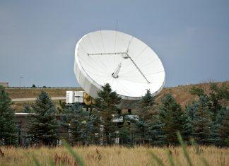 Amazon Pursuing Acquisition of Globalstar to Challenge Starlink Satellite communications infrastructure representing Amazon's expansion into space-based telecommunications technology