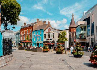 Apple at 50: Key Technology Milestones Shaping Irish Operations Apple headquarters campus in Cork Ireland technology hub with modern office buildings