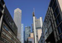 Central Banks Freeze Rates Amid Middle East War Uncertainty Central bank headquarters building representing monetary policy decisions amid global economic uncertainty