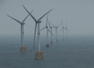 Irish Renewable Energy Shields Consumers from Iran Conflict Impact Offshore wind turbines generating renewable electricity for Ireland's national grid