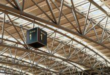 Irish Travellers Face Hidden Fees and Disruptions This Summer 2025 Irish passengers at Dublin Airport terminal preparing for summer holiday travel with luggage and boarding passes