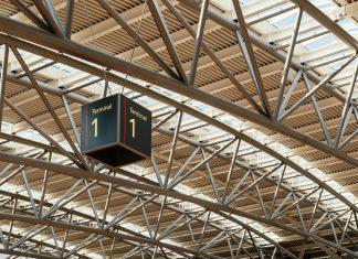 Irish Travellers Face Hidden Fees and Disruptions This Summer 2025 Irish passengers at Dublin Airport terminal preparing for summer holiday travel with luggage and boarding passes