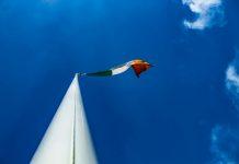 Opposition Parties Demand Three Additional Bank Holidays for Ireland Irish workers discussing workplace benefits and bank holiday entitlements in modern office environment