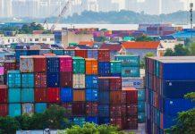 US Trade Deficit Expansion Signals Broader Economic Shifts International shipping containers representing global trade flows and economic activity between United States and Ireland