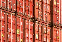 US Trade Gap Expands as Import Surge Offsets Record Export Growth International shipping containers representing global trade flows between United States and Ireland