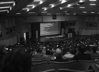 Web Summit Contests Breach of Contract Claim Over Qatar Event Technology conference stage with speakers at corporate event venue representing Web Summit dispute